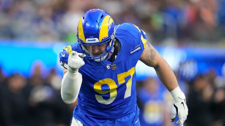 Los Angeles Rams defensive tackle Michael Hoecht celebrates after sacking Denver Broncos quarterback Russell Wilson during the second half of an NFL football game between the Los Angeles Rams and the Denver Broncos on Sunday, Dec. 25, 2022, in Inglewood, Calif. (Marcio J. Sanchez/AP Photo)