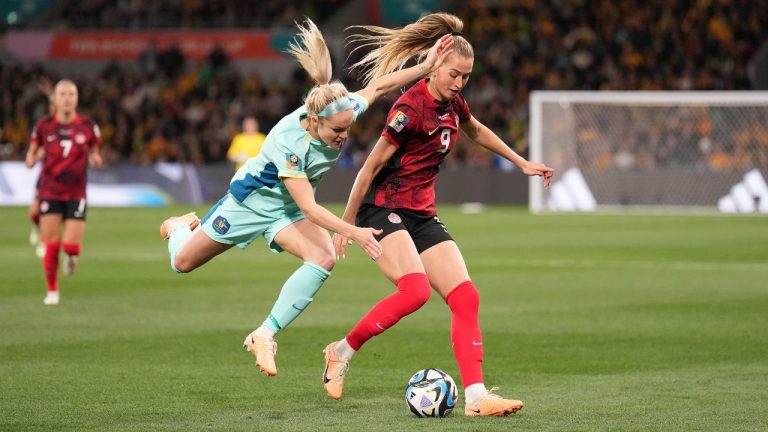 Ellie Carpenter of Australia and Jordyn Huitema of Canada vie for the ball during Group B soccer action at the FIFA Women's World Cup in Melbourne, Australia, Monday, July 31, 2023. (Scott Barbour/CP)