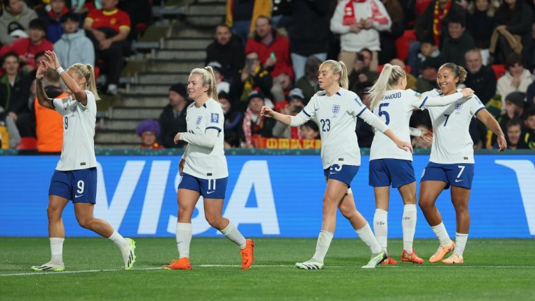 England's Lauren James, right, celebrates with teammate after scored during the Women's World Cup Group D soccer match between China and England in Adelaide, Australia, Tuesday, Aug. 1, 2023. (James Elsby/AP)