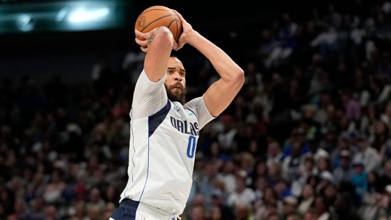 Dallas Mavericks center JaVale McGee prepares to shoot a 3-point basket in the first half of an NBA basketball against the Chicago Bulls, Friday, April 7, 2023, in Dallas. (Tony Gutierrez/AP)