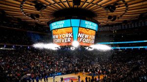 Fans stand for the start of the first half of Game 1 in the NBA basketball Eastern Conference semifinals playoff series between the New York Knicks and the Miami Heat at Madison Square Garden, Sunday, April 30, 2023, in New York. (John Minchillo/AP Photo)