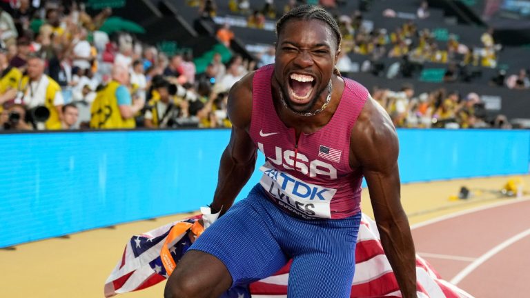 Noah Lyles, of the United States, celebrates after winning the gold medal in the Men's 100-meter final during the World Athletics Championships in Budapest, Hungary, Sunday, Aug. 20, 2023. (Matthias Schrader/AP)