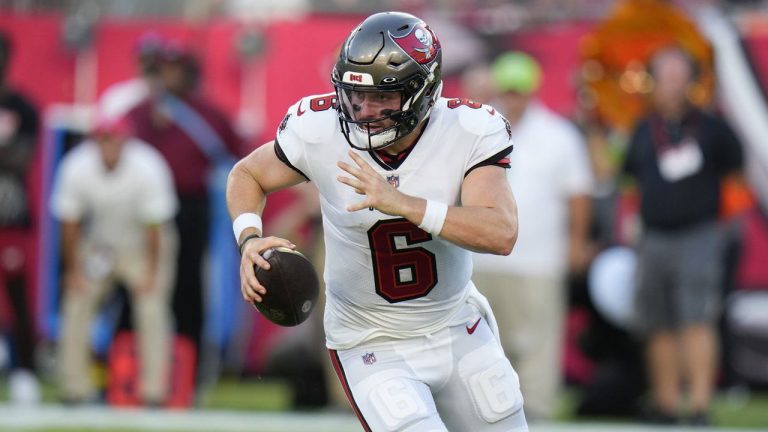 Tampa Bay Buccaneers quarterback Baker Mayfield scrambles against the Pittsburgh Steelers during the first half of an NFL preseason football game. (Chris O'Meara/AP)