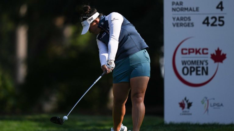 Megan Khang, of the U.S., hits her tee shot on the 10th hole during the third round at the LPGA CPKC Canadian Women's Open golf tournament, in Vancouver, on Saturday, August 26, 2023. (Darryl Dyck/CP)