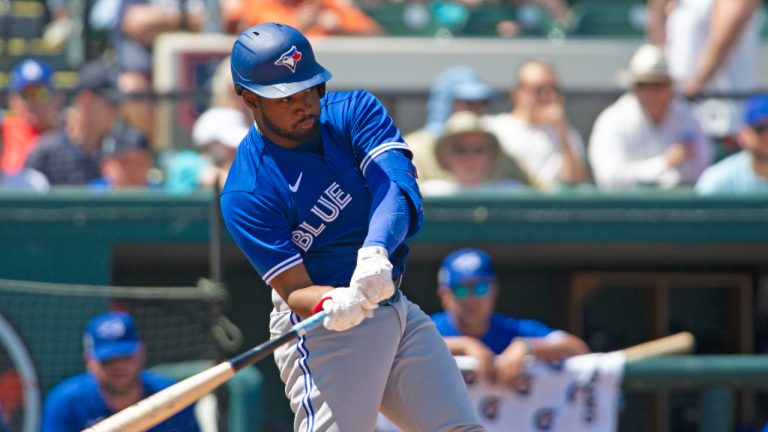 Toronto Blue Jays infielder Orelvis Martinez swings during a spring training game against the Detroit Tigers, Monday, March 21, 2022, in Lakeland, Fla. (Mark Taylor/CP)