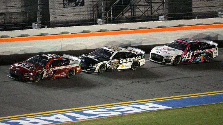 Chase Briscoe (14), Aric Almirola (10) and Ryan Preece (41) head along the front stretch during the NASCAR Cup Series auto race at Daytona International Speedway, Saturday, Aug. 26, 2023, in Daytona Beach, Fla. (Phelan M. Ebenhack/AP)