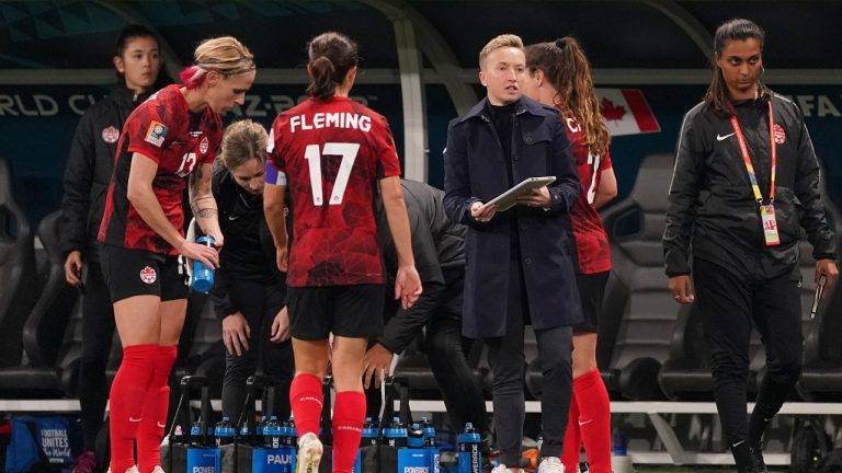 Canada coach Bev Priestman speaks to her players during a break in second half Group B soccer action against Australia at the FIFA Women's World Cup in Melbourne, Australia, Monday, July 31, 2023. (Scott Barbour/CP)