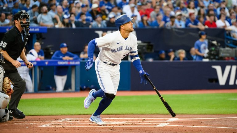 Toronto Blue Jays' George Springer (4) hits a solo home run against the Cleveland Guardians during second inning MLB baseball action in Toronto on Friday, August 25, 2023. (Christopher Katsarov/CP)