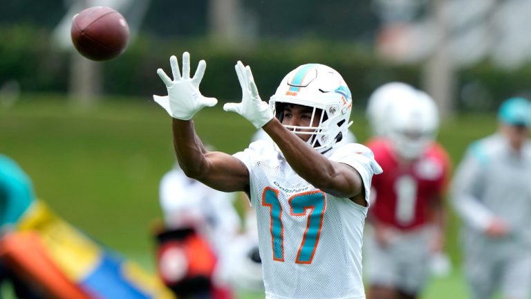 Miami Dolphins wide receiver Jaylen Waddle (17) does drills during practice at the NFL football team's training facility, Wednesday, July 26, 2023, in Miami Gardens, Fla. (Lynne Sladky/AP)