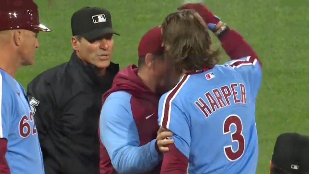 Phillies' Bryce Harper Signs His Helmet for a Young Fan After Being Ejected