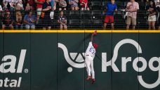 Rangers All-Star Garcia leaves after coming down hard trying to rob Astros of homer