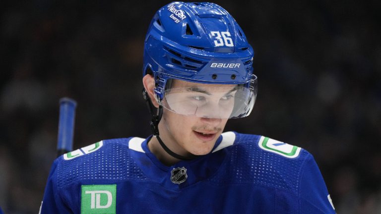 Vancouver Canucks' Akito Hirose waits for a faceoff during the second period of an NHL hockey game against the Los Angeles Kings in Vancouver, on Sunday, April 2, 2023. (Darryl Dyck/CP)