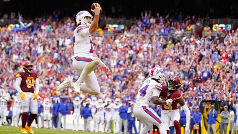 Buffalo Bills quarterback Josh Allen leaping into the endzone as he scores a touchdown against the Washington Commanders during the second half of an NFL football game, Sunday, Sept. 24, 2023, in Landover, Md. (Evan Vucci/AP Photo)