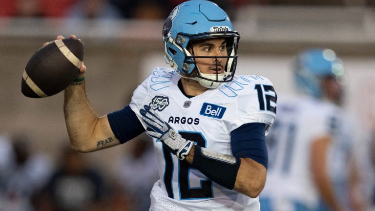 Toronto Argonauts quarterback Chad Kelly (12) throws against the Montreal Alouettes during first half CFL football action in Montreal, Friday, Sept.15, 2023. (Christinne Muschi/CP)