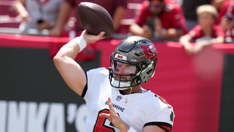 Tampa Bay Buccaneers quarterback Baker Mayfield throws a pass during warmups ahead of an NFL football game against the Chicago Bears. (Chris O'Meara/AP)