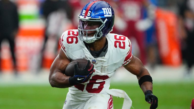 New York Giants running back Saquon Barkley (26) runs against the Arizona Cardinals during the second half of an NFL football game, Sunday, Sept. 17, 2023, in Glendale, Ariz. (Matt York/AP)