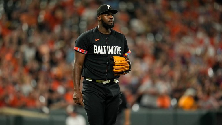 Baltimore Orioles relief pitcher Felix Bautista looks on during the ninth inning of a baseball game between the Baltimore Orioles and the Colorado Rockies. (Julio Cortez/AP)