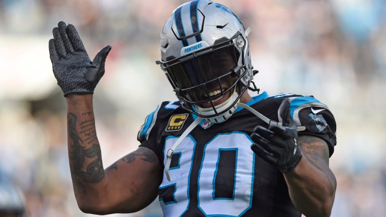 In this Dec. 24, 2017, file photo, Carolina Panthers' Julius Peppers (90) reacts to a play against the Tampa Bay Buccaneers during the second half of an NFL football game in Charlotte, N.C. (Mike McCarn/AP) 