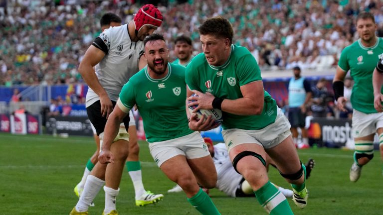 Ireland's Joe McCarthy runs to score a try during the Rugby World Cup Pool B match between Ireland and Romania at the Stade de Bordeaux in Bordeaux, France, Saturday, Sept. 9, 2023. (Themba Hadebe/AP) 