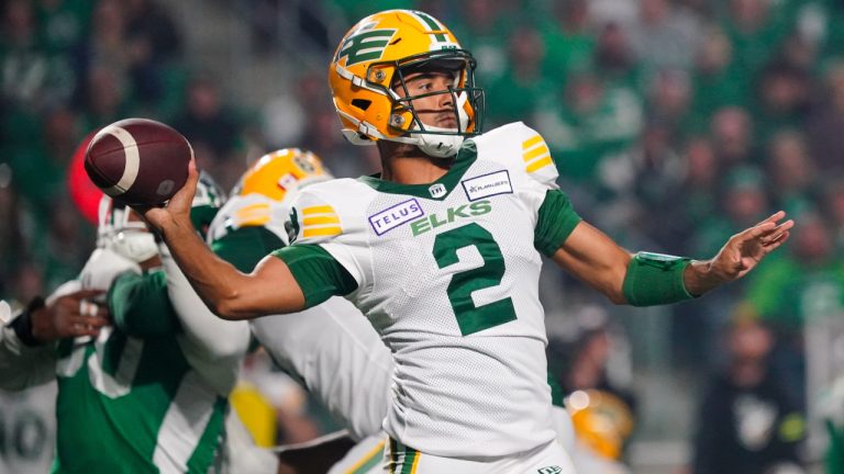 Edmonton Elks quarterback Tre Ford (2) throws against Saskatchewan Roughriders during the first half of CFL football action in Regina, on Friday, September 15, 2023. (Heywood Yu/CP)