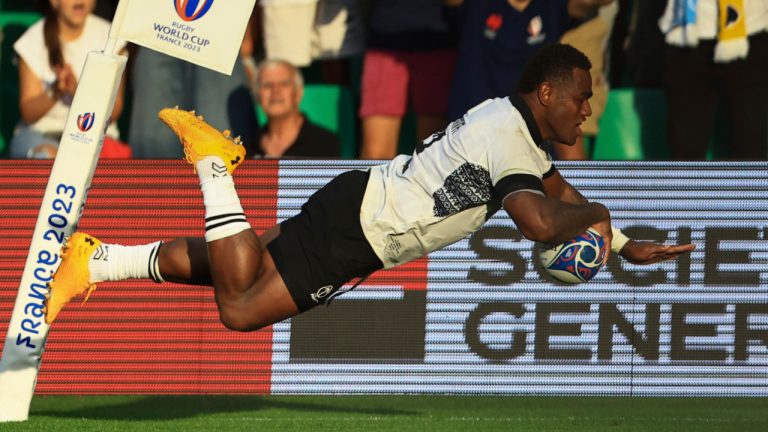 Fiji's Josua Tuisova scores a try during the Rugby World Cup Pool C match between Australia and Fiji at the Stade Geoffroy Guichard in Saint-Etienne, France, Sunday, Sept. 17, 2023. (Aurelien Morissard/AP) 