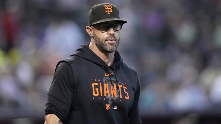 San Francisco Giants manager Gabe Kapler walks back to the dugout during the third inning of a baseball game against the Arizona Diamondbacks Wednesday, Sept. 20, 2023, in Phoenix. (Ross D. Franklin/AP)