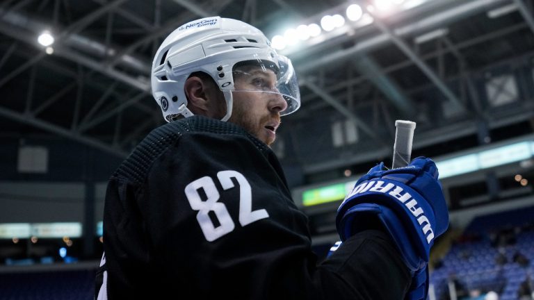 The Vancouver Canucks' Ian Cole takes a break during the opening day of the NHL hockey team's training camp, in Victoria, Thursday, Sept. 21, 2023. (Darryl Dyck/CP)