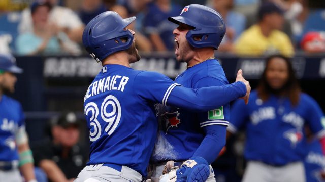 Blue Jays whoop it up after clinching spot in playoffs before wild