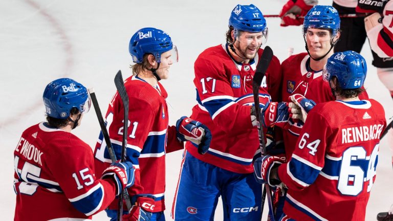 Montreal Canadiens Josh Anderson (17) celebrates his goal with the assist by David Reinbacher (64) with teammates Alex Newhook (15), Kaiden Guhle (21) and Juraj Slafkovsky (20) during second period NHL preseason hockey action against New Jersey Devils in Montreal on Monday, Sept. 25, 2023. (CP)