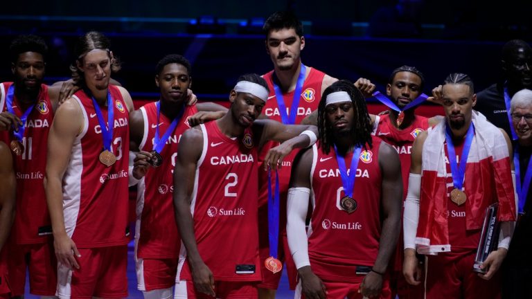 Canada players pose for a photo after the Basketball World Cup bronze medal game between the United States and Canada in Manila, Philippines, Sunday, Sept. 10, 2023. (Michael Conroy/AP)