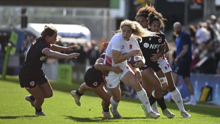 England's Abby Dow, centre, in action, during the first rugby test match between England and Canada, at Sandy Park, in Exeter, England, Saturday, Sept. 23, 2023. (Simon Galloway/PA via AP)