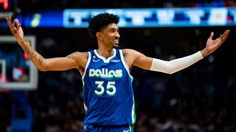 Dallas Mavericks forward Christian Wood (35) gestures to the crowd after scoring in the second half of an NBA basketball game against the Los Angeles Lakers in Dallas, Sunday, Dec. 25, 2022. (Emil T. Lippe/AP)