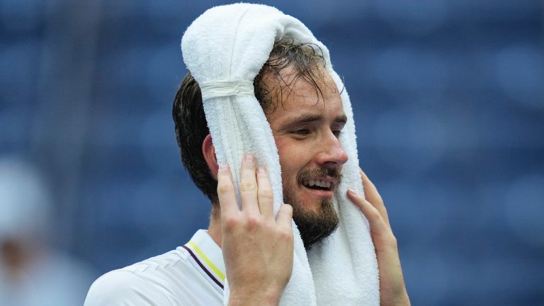 Daniil Medvedev, of Russia, cools off after defeating Andrey Rublev, of Russia, during the quarterfinals of the U.S. Open tennis championships, Wednesday, Sept. 6, 2023, in New York. (Seth Wenig/AP)