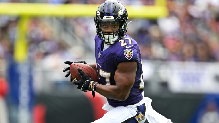 Baltimore Ravens running back J.K. Dobbins (27)runs with the ball after making a catch during the first half of an NFL football game against the Houston Texans, Sunday, Sept. 10, 2023, in Baltimore. (Terrance Williams/AP)