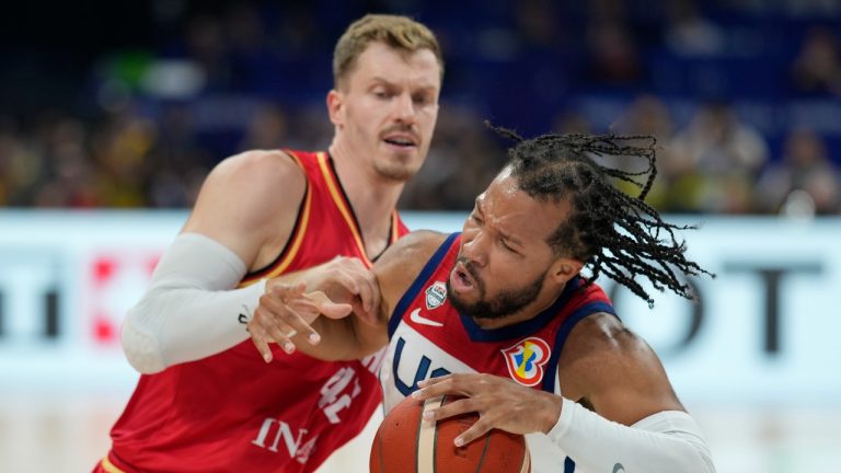 U.S. guard Jalen Brunson, right, pushes past Germany guard Andreas Obst during a Basketball World Cup semi final game in Manila, Philippines, Friday, Sept. 8, 2023. (Aaron Favila/AP Photo)