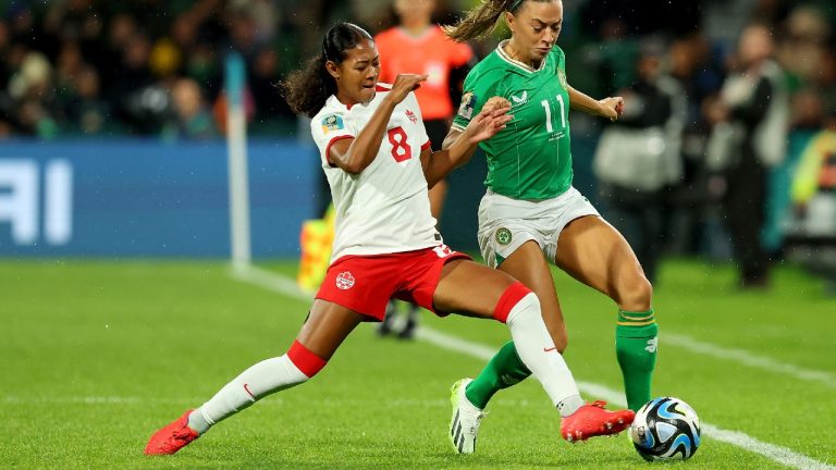 Jayde Riviere of Canada makes a tackle against Katie McCabe of Ireland during the Group B match at the FIFA Women's World Cup in Perth, Australia, Wednesday, July 26, 2023. (James Worsfold/CP)