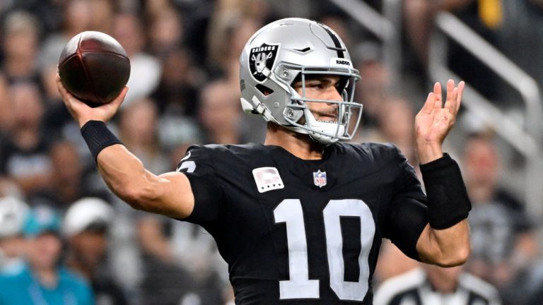 Las Vegas Raiders quarterback Jimmy Garoppolo throws during the first half of an NFL football game against the Pittsburgh Steelers. (AP Photo/David Becker)