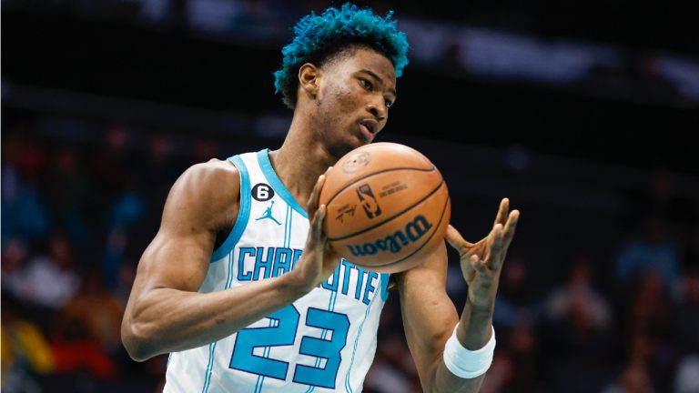 Charlotte Hornets forward Kai Jones passes after pulling in a rebound against the Cleveland Cavaliers during the second half of an NBA basketball game in Charlotte, N.C., Tuesday, March 14, 2023. (Nell Redmond/AP)