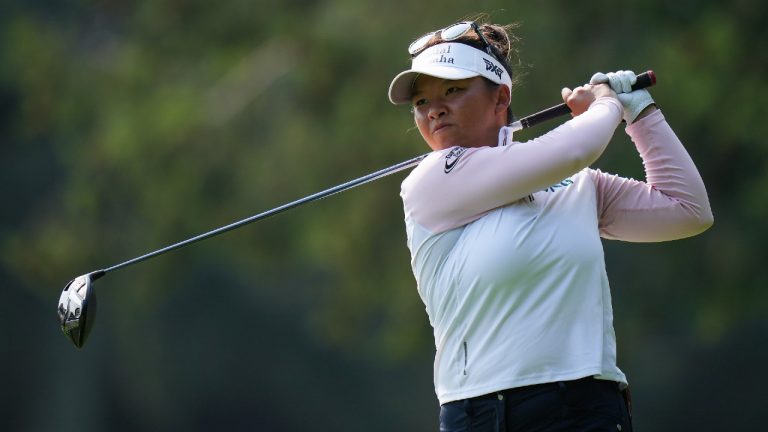 Megan Khang, of the U.S., watches her tee shot on the seventh hole during the final round at the LPGA CPKC Canadian Women's Open golf tournament, in Vancouver, on Sunday, August 27, 2023. (Darryl Dyck/CP)