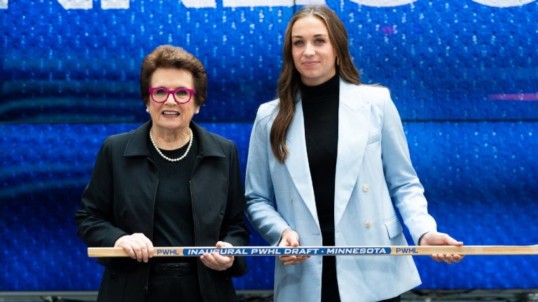 Minnesota's Tayler Heise, right, from the NCAA,poses for a photo with former American tennis player Billie Jean King after being selected 1st overall during the first round of the inaugural Professional Women’s Hockey League draft in Toronto, on Monday, Sept. 18, 2023. (Spencer Colby/CP)