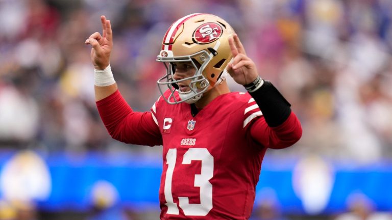 San Francisco 49ers quarterback Brock Purdy gestures before a snap during the first half of an NFL football game against the Los Angeles Rams. (Ashley Landis/AP)