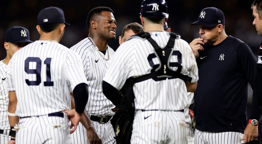 New York Yankees pitcher Ron Marinaccio reacts on the mound during