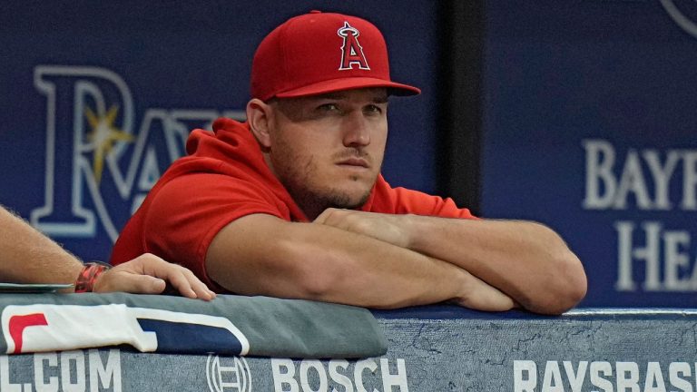 Los Angeles Angels outfielder Mike Trout watches from the bench during the first inning of a baseball game against the Tampa Bay Rays Tuesday, Sept. 19, 2023, in St. Petersburg, Fla. (Chris O'Meara/AP Photo)