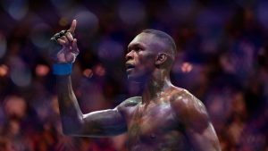 Israel Adesanya reacts after knocking out Alex Pereira in their middleweight title match during the UFC 287 event at the Kaseya Center on April 8, 2023, in downtown Miami. (Matias J. Ocner/Miami Herald via AP)