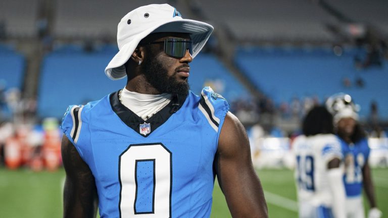 FILE - Carolina Panthers outside linebacker Brian Burns (0) looks on after a preseason NFL football game against the Detroit Lions Friday, Aug. 25, 2023, in Charlotte, N.C. Brian Burns sat out his second consecutive practice Monday, Sept. 4, because of a contract dispute, raising questions about whether the two-time Pro Bowler will play in Sunday’s regular-season opener against the Atlanta Falcons. (AP Photo/Jacob Kupferman, File)