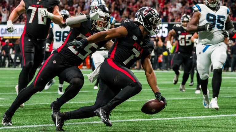 Bijan Robinson celebrating a first-half touchdown in during the Falcons Week 1 home win over the Carolina Panthers. (Photo by Danny Karnik/AP)