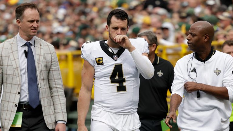 New Orleans Saints quarterback Derek Carr (4) walks to the locker room after being injured during the second half of an NFL football game against the Green Bay Packers Sunday, Sept. 24, 2023, in Green Bay, Wis. (Matt Ludtke/AP)