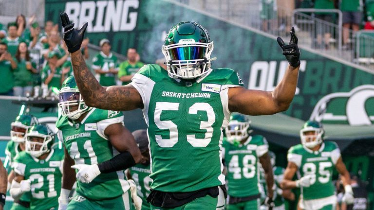 Saskatchewan Roughriders linebacker Darnell Sankey (53) runs onto the field before CFL football action against BC Lions in Regina. (Heywood Yu/THE CANADIAN PRESS)