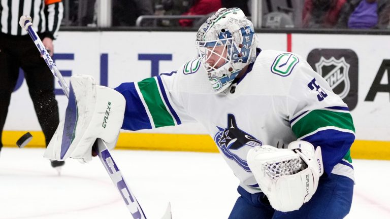 Vancouver Canucks goaltender Thatcher Demko (35) stops a shot against the Los Angeles Kings during the second period of an NHL hockey game Saturday, March 18, 2023, in Los Angeles. (Marcio Jose Sanchez/AP)