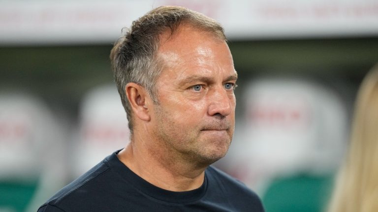 Germany head coach Hansi Flick looks at the field before an international friendly soccer match between Germany and Japan in Wolfsburg, Germany, Saturday, Sept. 9, 2023. (Martin Meissner/AP)